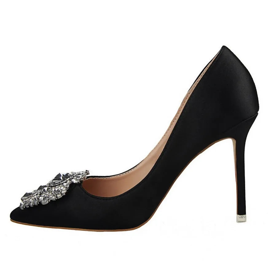 Black women's stiletto high heels with pointed toe and super high heel over 8 cm