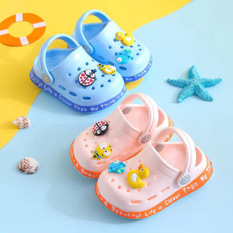 Colourful cartoon animal print PVC slippers for toddlers and children in summer.