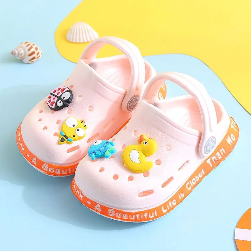 Colourful cartoon animal print PVC slippers for toddlers and children in summer.