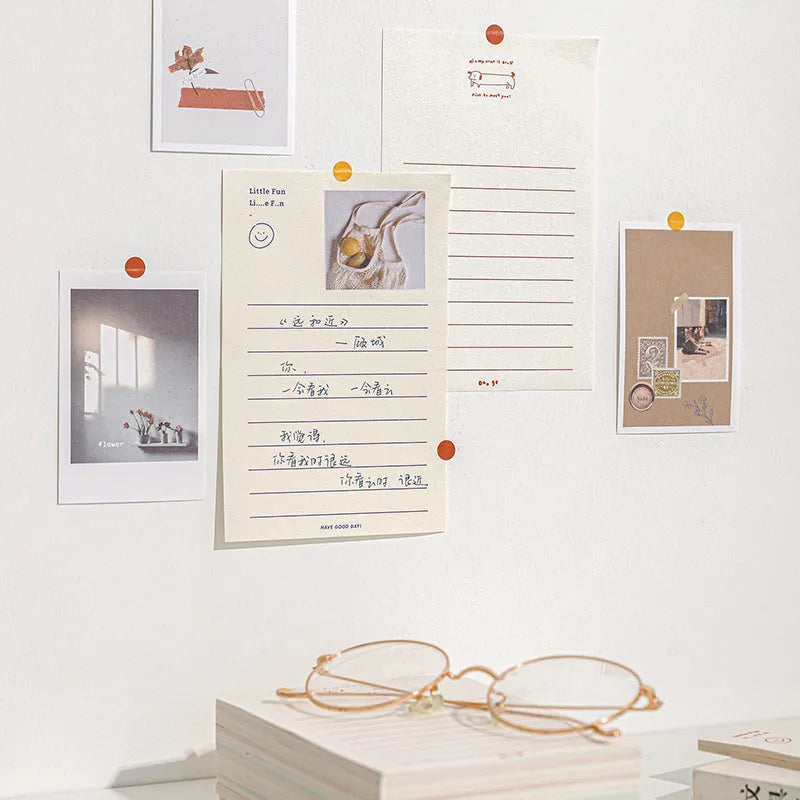 A rectangular memo pad notebook with a choice of paper cover designs, shown open to reveal blank or lined writing pages.