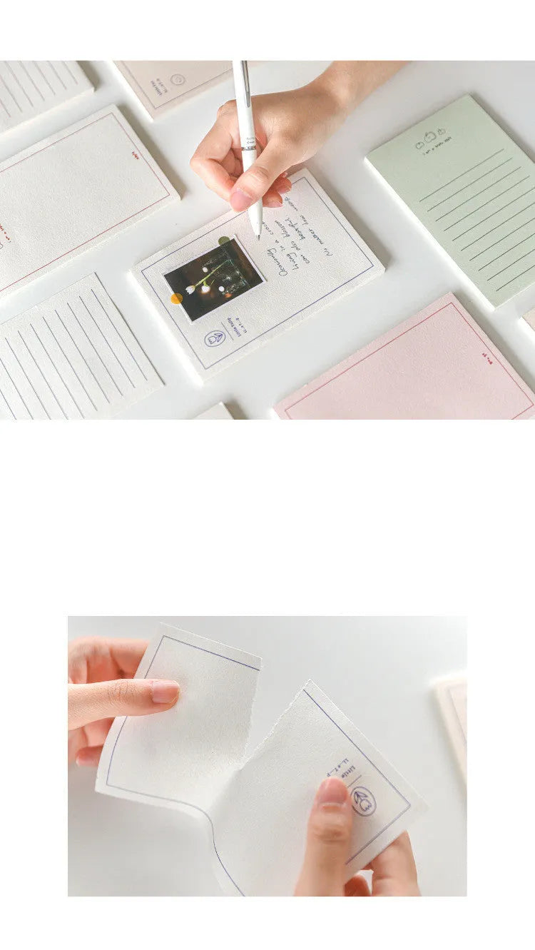 A rectangular memo pad notebook with a choice of paper cover designs, shown open to reveal blank or lined writing pages.