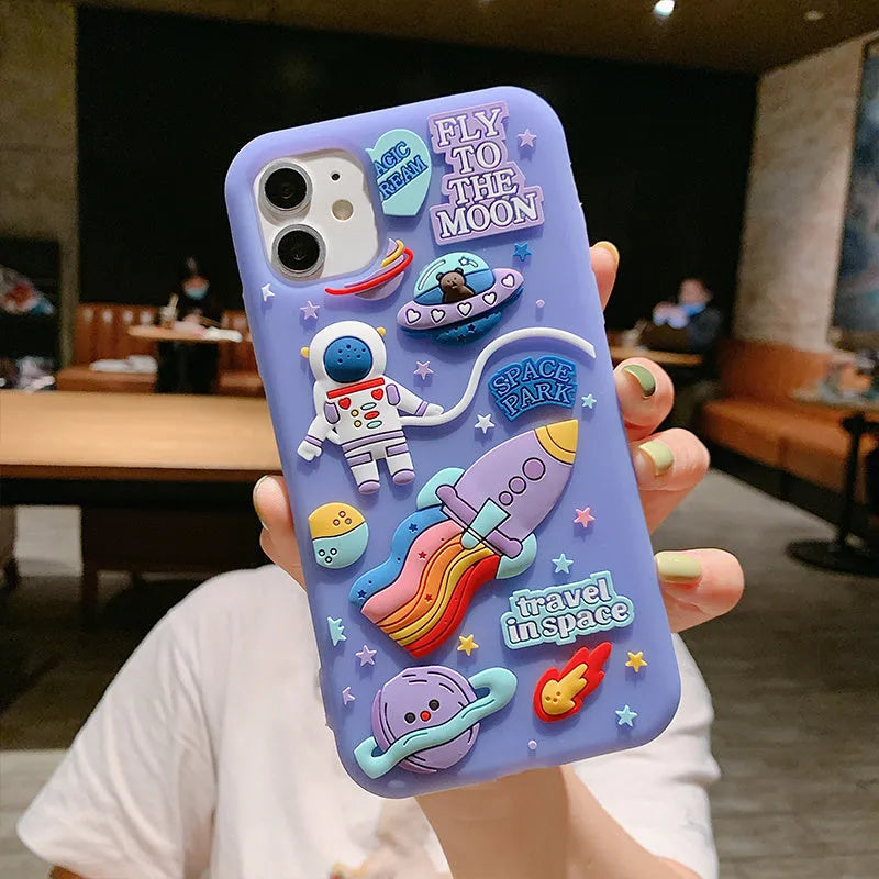Purple silicone iPhone case with cartoon astronaut design for multiple models