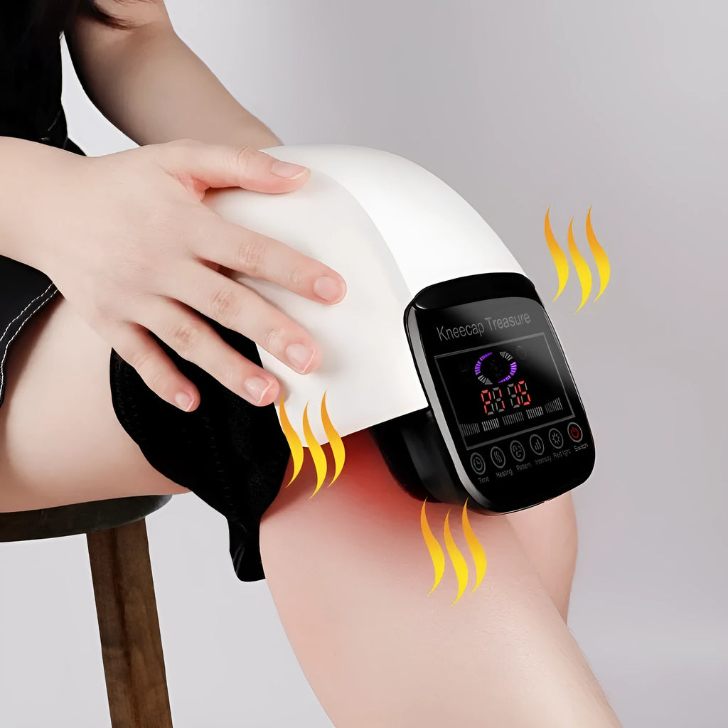 White electric heating knee pad massager with ABS plastic body and USB cable on a neutral background