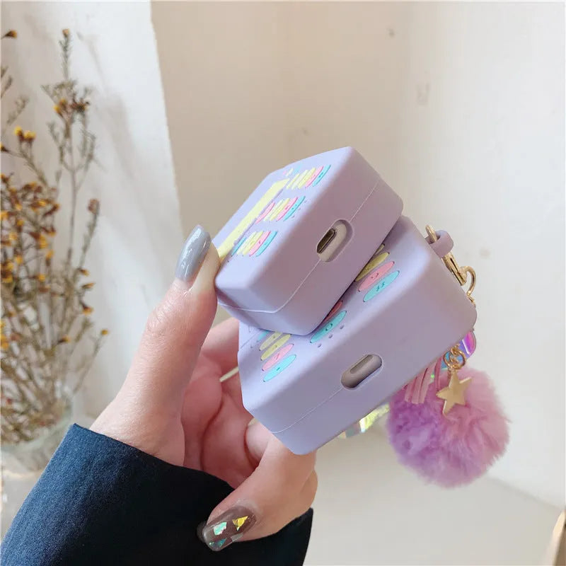 Purple silicone AirPods Pro case with fur ball pendant compatible with Apple wireless earbuds