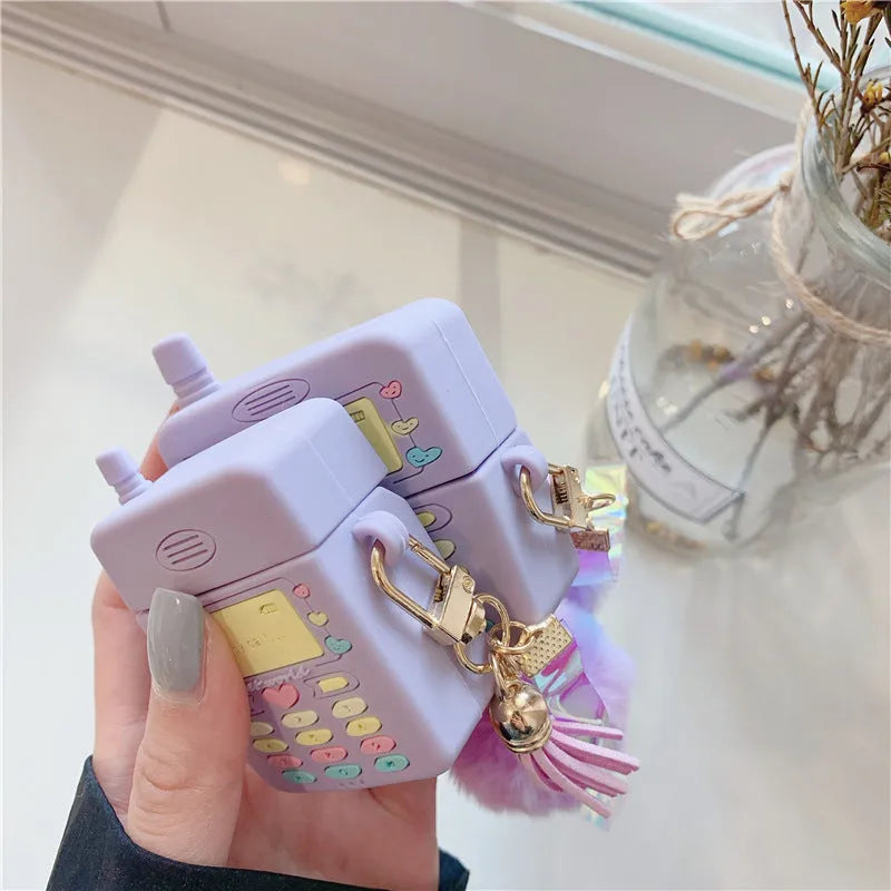 Purple silicone AirPods Pro case with fur ball pendant compatible with Apple wireless earbuds