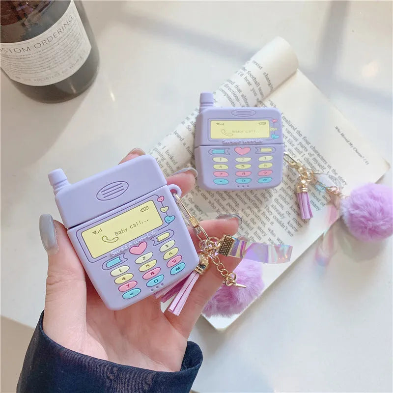 Purple silicone AirPods Pro case with fur ball pendant compatible with Apple wireless earbuds