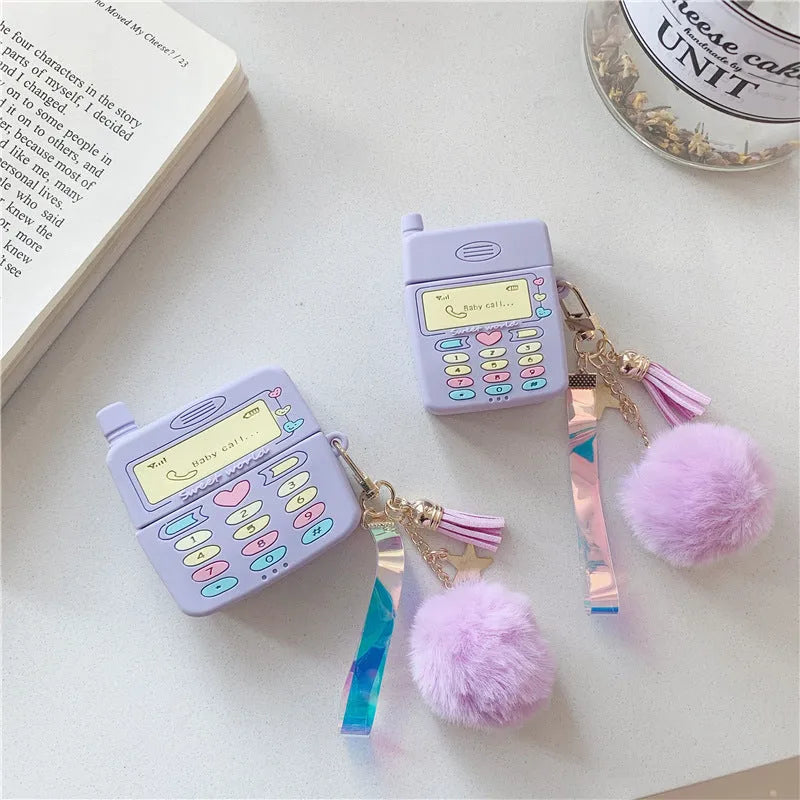 Purple silicone AirPods Pro case with fur ball pendant compatible with Apple wireless earbuds