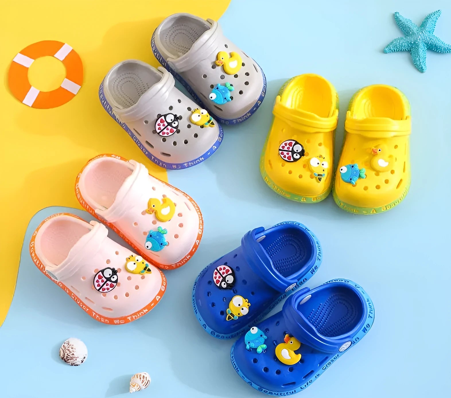 Colourful cartoon animal print PVC slippers for toddlers and children in summer.