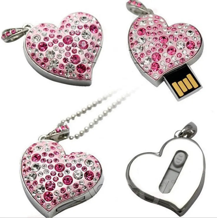 Heart shaped USB flash drive with metal shell, drill hole and USB 2.0 connector.