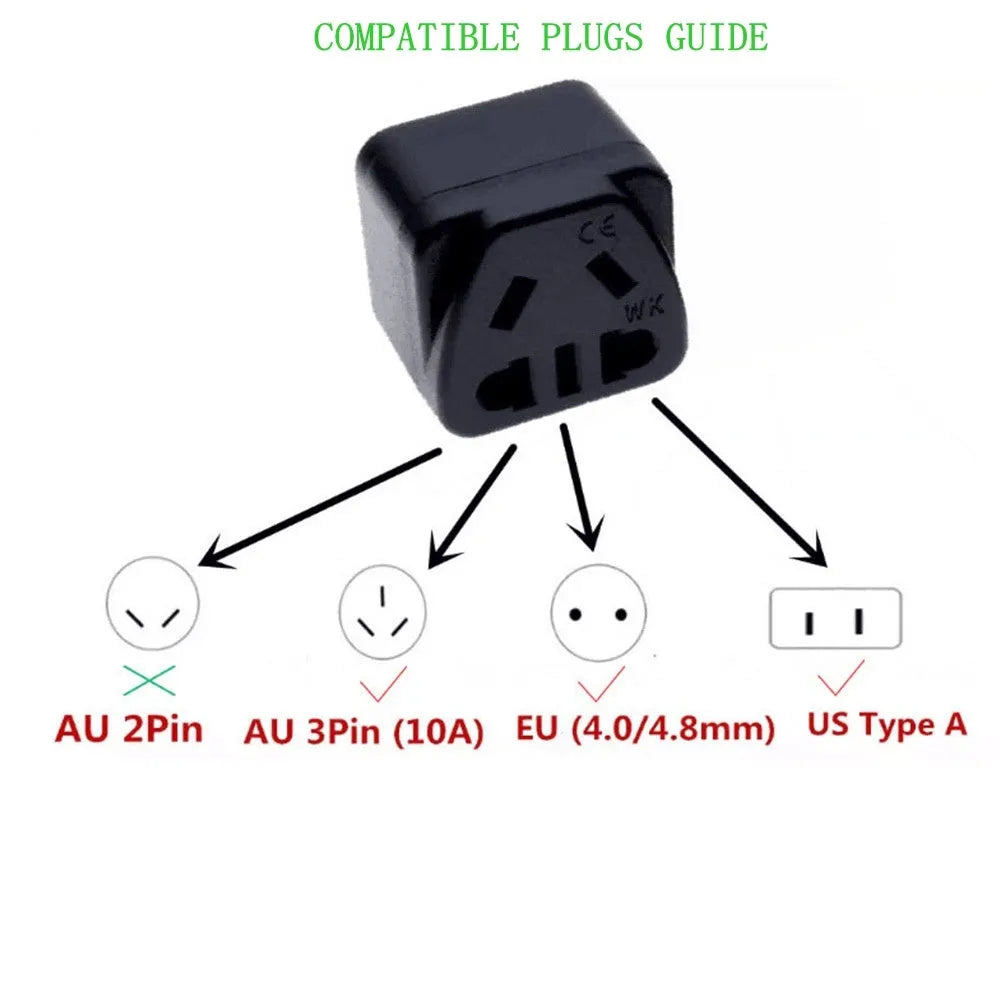 White and black UK three-pin to international power conversion adapter with grounding pins