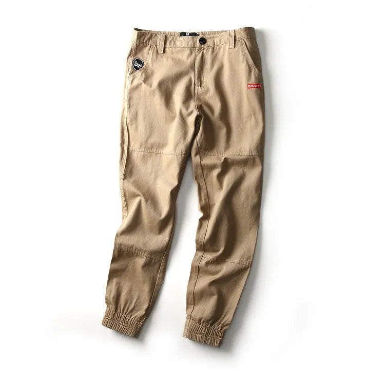 Mid-waist slim-fit cotton harem trousers with feet in black, size M, shown front view
