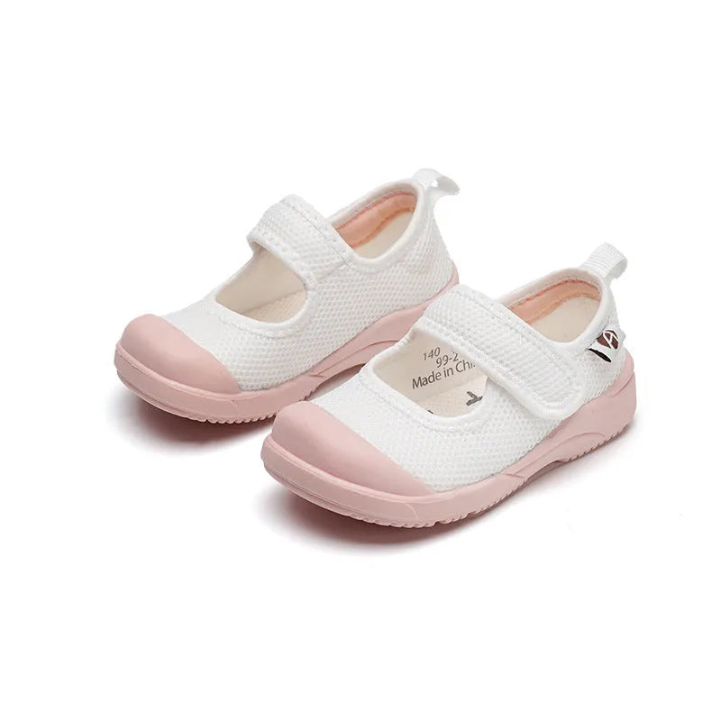 White and pink toddler cloth shoes with Velcro straps and breathable mesh upper