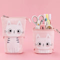 Round Korean-style canvas pencil bag with cartoon pattern, shown with pens inside.