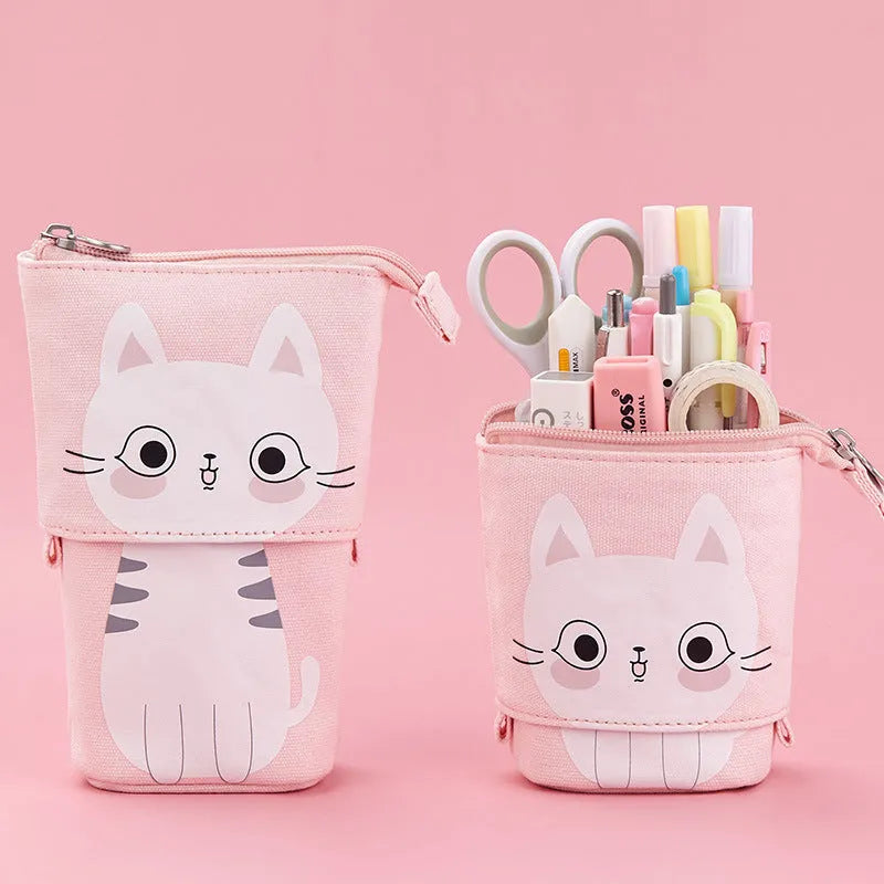 Round Korean-style canvas pencil bag with cartoon pattern, shown with pens inside.