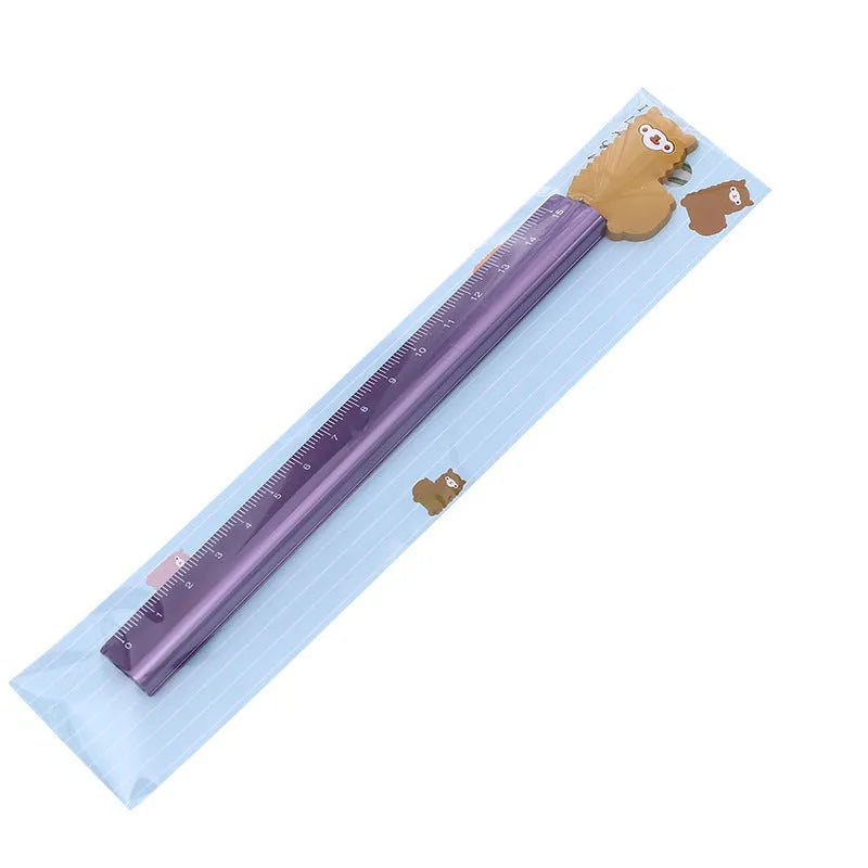 Colourful alpaca design printed on a silver 20 cm aluminium straight ruler.
