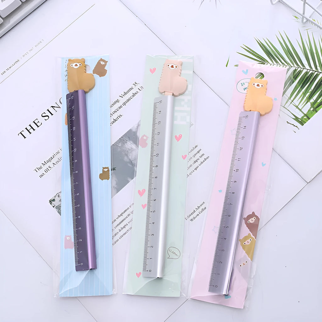 Colourful alpaca design printed on a silver 20 cm aluminium straight ruler.