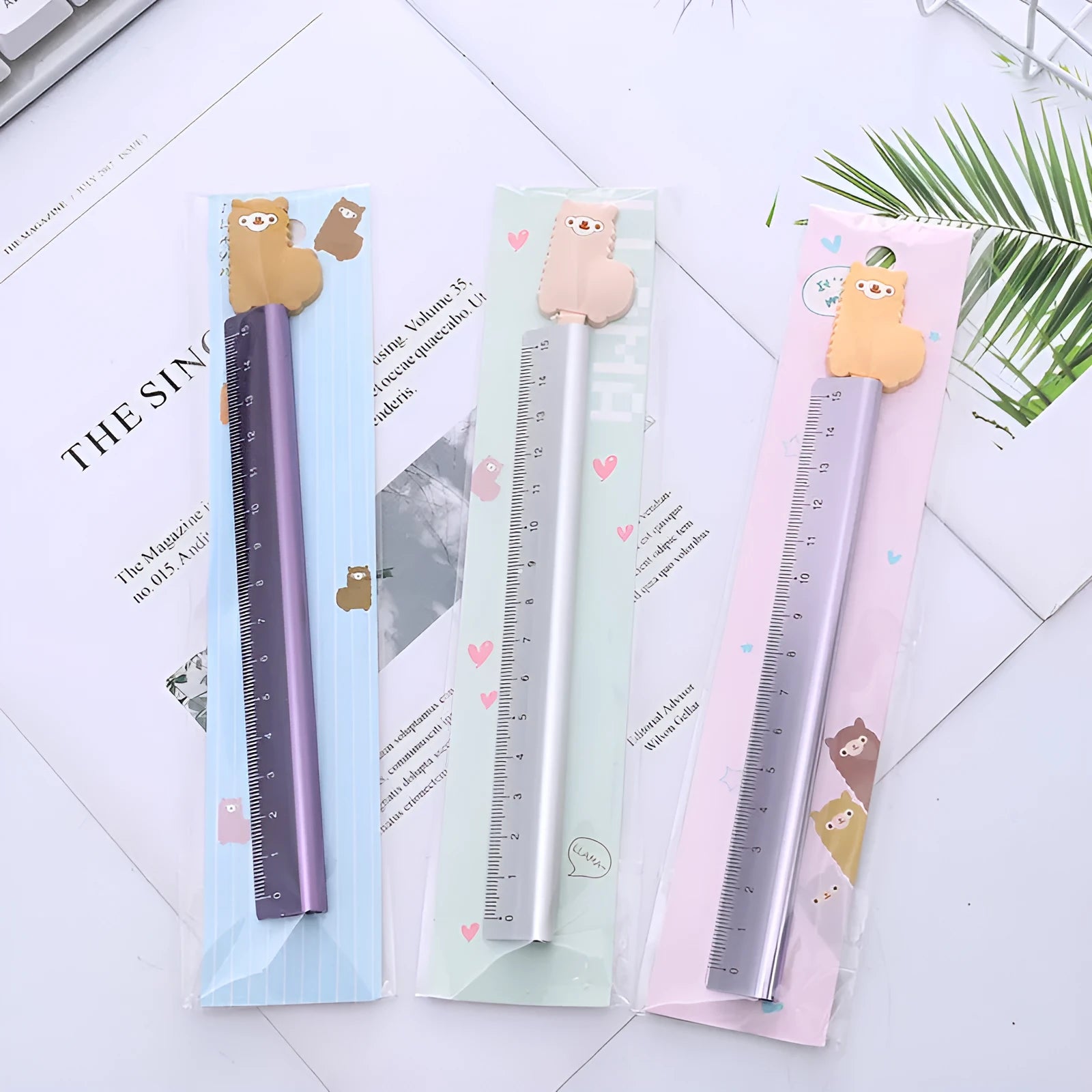 Colourful alpaca design printed on a silver 20 cm aluminium straight ruler.