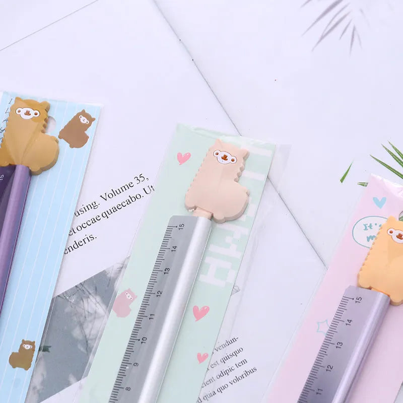 Colourful alpaca design printed on a silver 20 cm aluminium straight ruler.