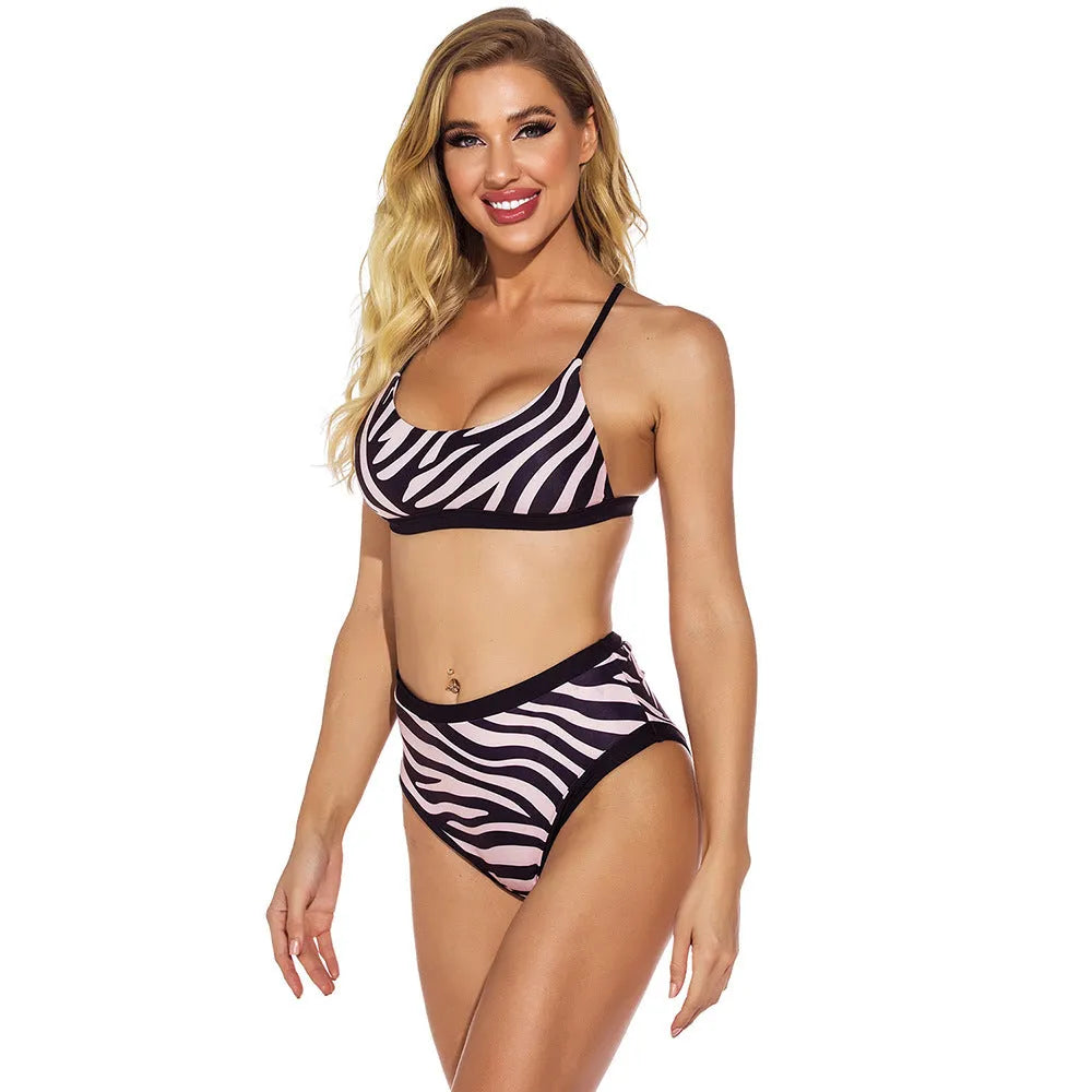High waist split printed bikini set in polyester fabric shown on a model, available in S M L XL sizes