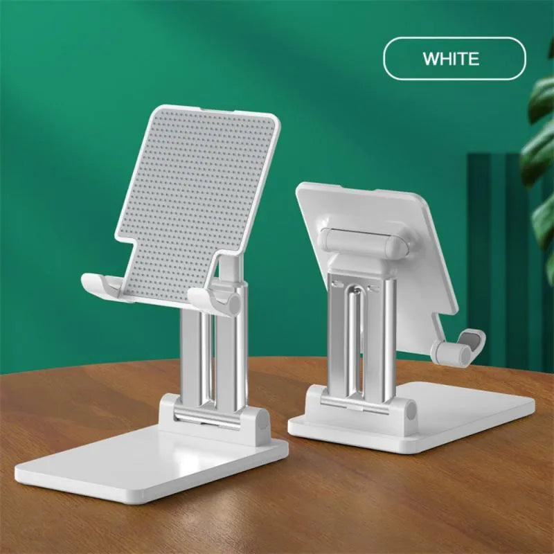 Black universal adjustable dual-rod phone bracket mounted on a desk edge, holding a smartphone.