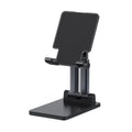 Black universal adjustable dual-rod phone bracket mounted on a desk edge, holding a smartphone.