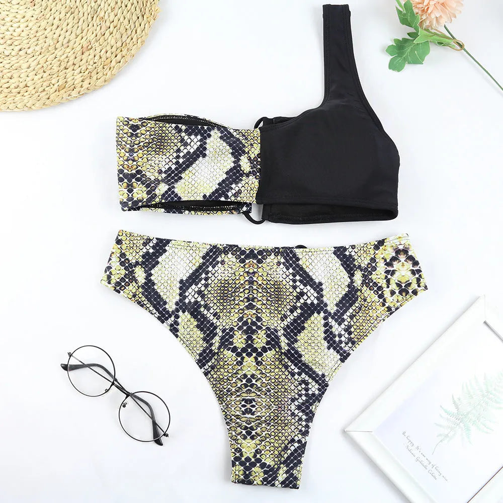 Ladies one shoulder leopard print split swimsuit with removable chest pad, side view on model