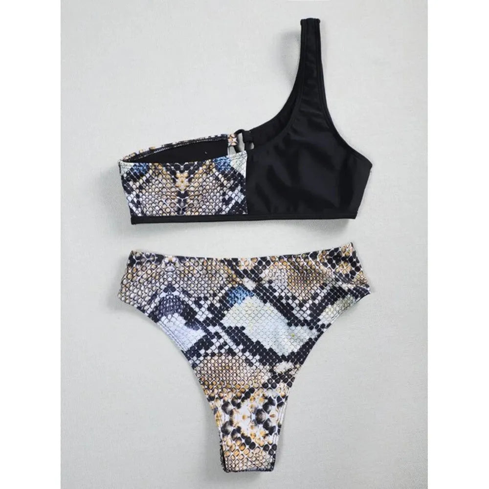 Ladies one shoulder leopard print split swimsuit with removable chest pad, side view on model