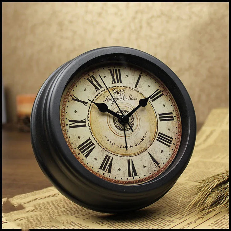 A round 6-inch retro European style desk alarm clock with a silent sweep movement on a wooden surface.