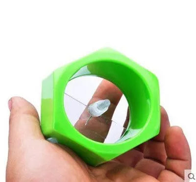 Yellow and green ABS plastic spiral vegetable cutter for slicing cucumbers, showing 8cm diameter.