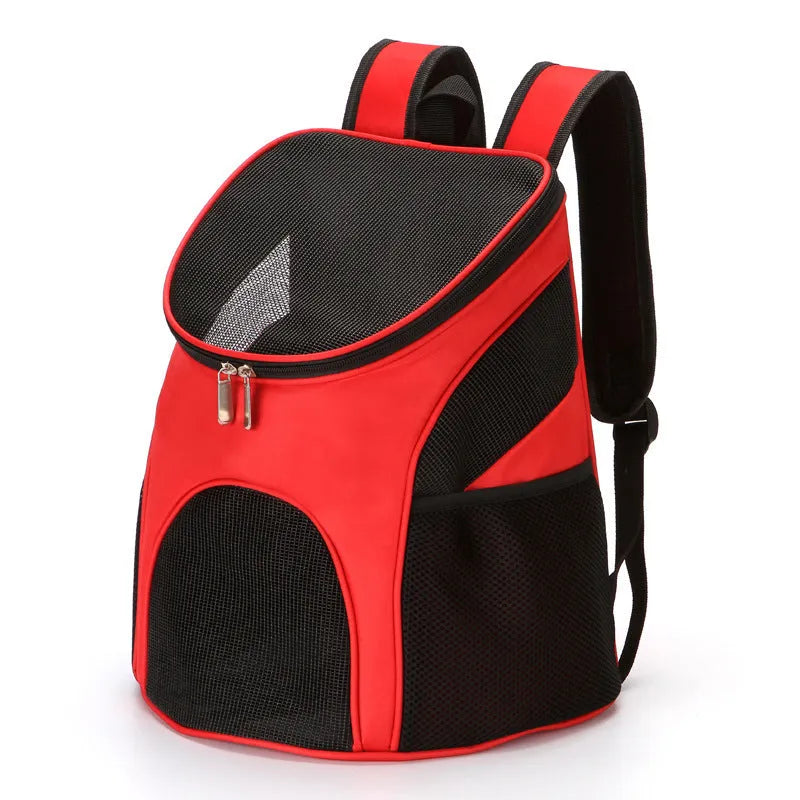 Red pet backpack carrier with ventilation windows and adjustable straps for a dog or cat.
