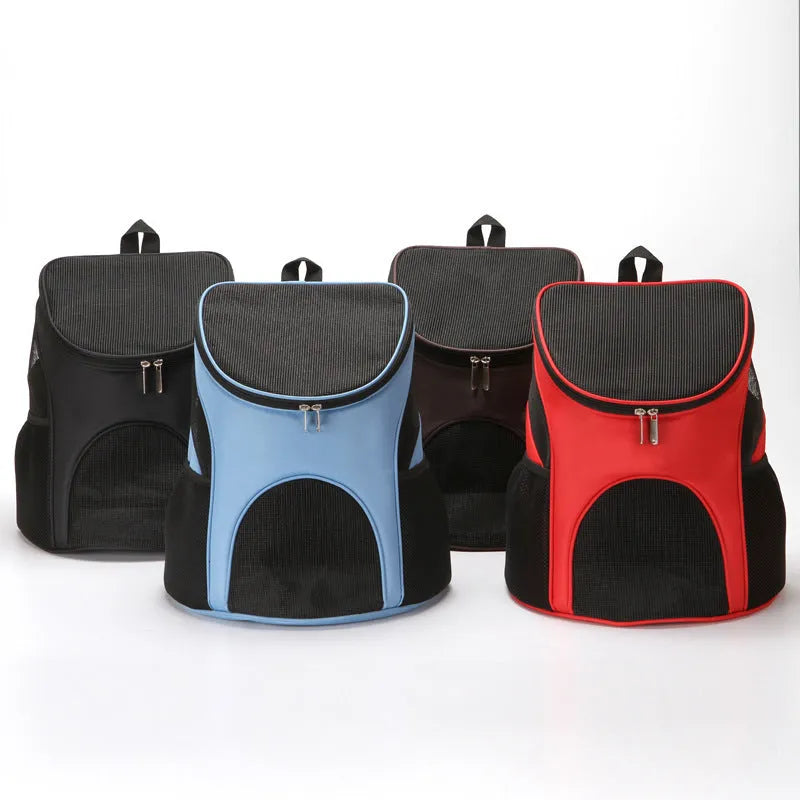 Red pet backpack carrier with ventilation windows and adjustable straps for a dog or cat.