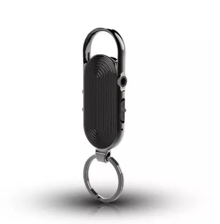 Black zinc alloy portable voice recorder with USB cable and earphones.