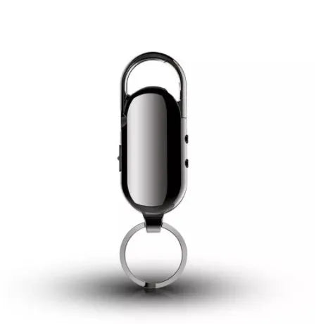 Black zinc alloy portable voice recorder with USB cable and earphones.