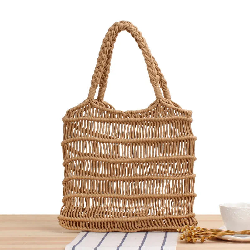 Women's woven straw shoulder bag in square vertical design with soft handles in white colour option