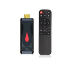 Smart network TV set-top box dongle with remote control, HDMI cable, and power supply.