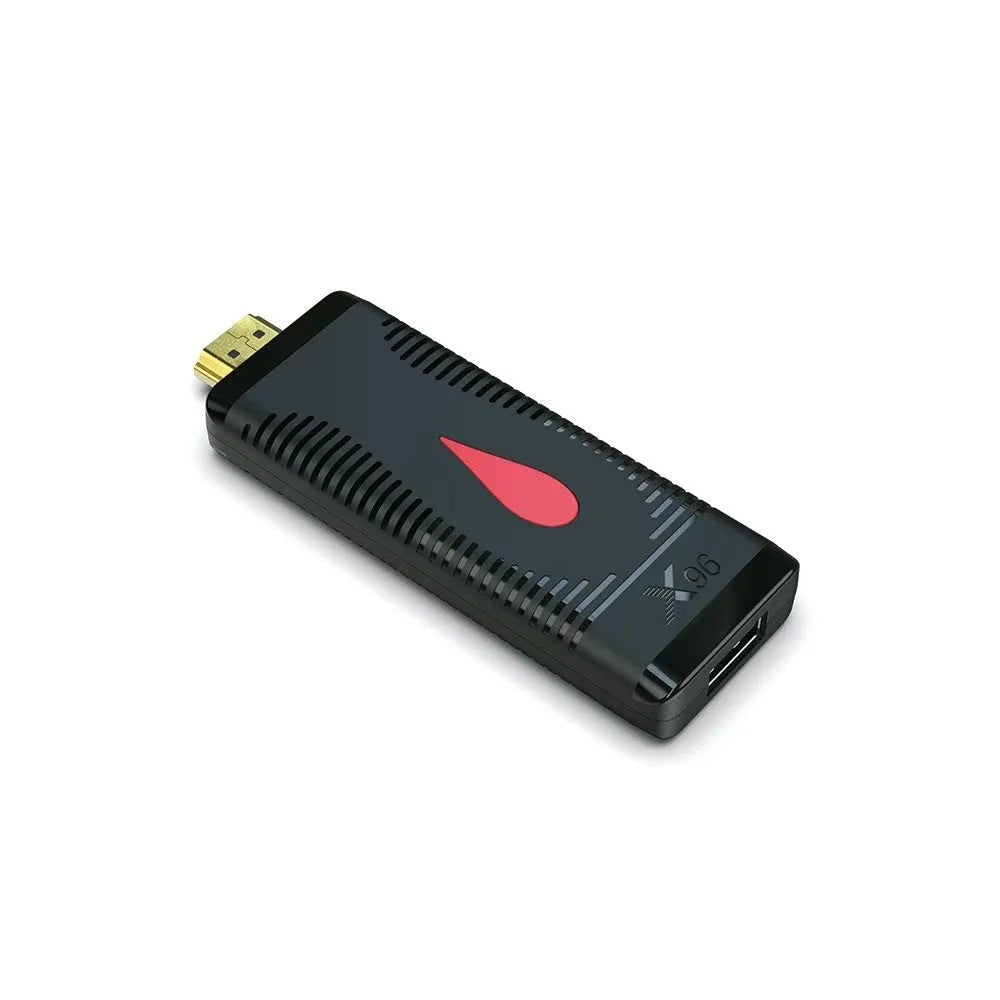 Smart network TV set-top box dongle with remote control, HDMI cable, and power supply.