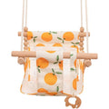 Cotton canvas baby swing chair with wooden seat and cushion hanging indoors