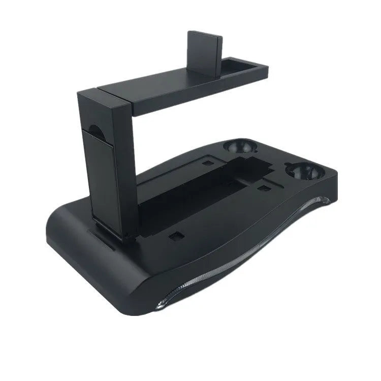 Black ABS plastic charging base for PS4 VR controllers on a surface.