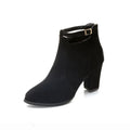 Women's high-heeled Martin boots in black with belt buckle detail, low tube, round toe, and faux fur lining
