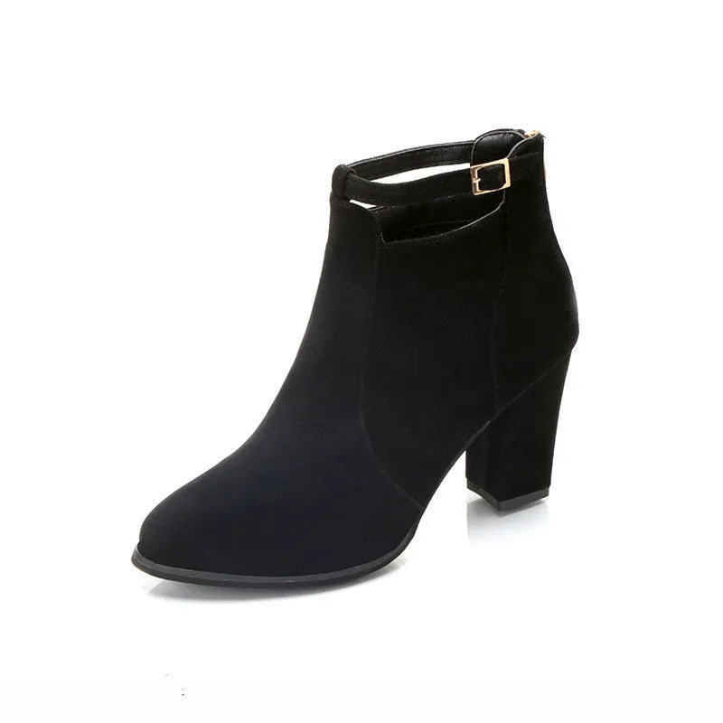 Women's high-heeled Martin boots in black with belt buckle detail, low tube, round toe, and faux fur lining