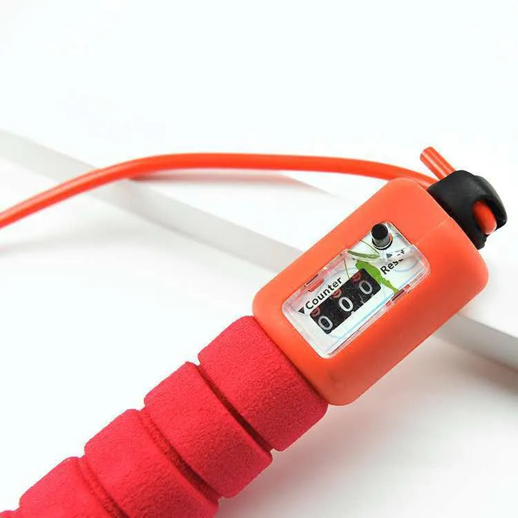 Adult synchronised sports skipping rope with counting display and sponge handles