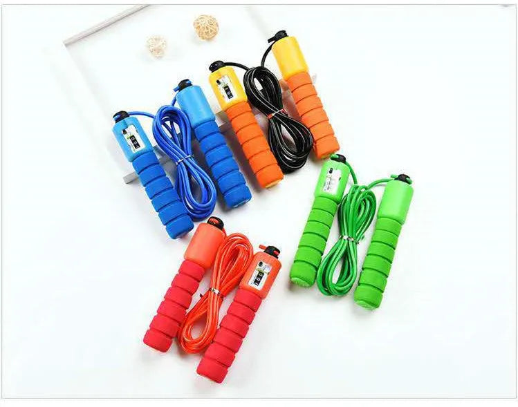 Adult synchronised sports skipping rope with counting display and sponge handles