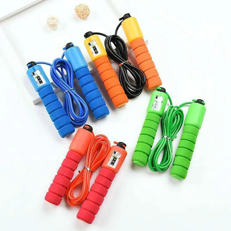 Adult synchronised sports skipping rope with counting display and sponge handles