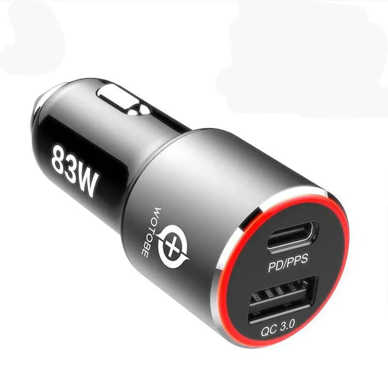 Compact 83W dual-port fast car charger with USB-C and QC3.0 ports plugged into a vehicle 12V socket.