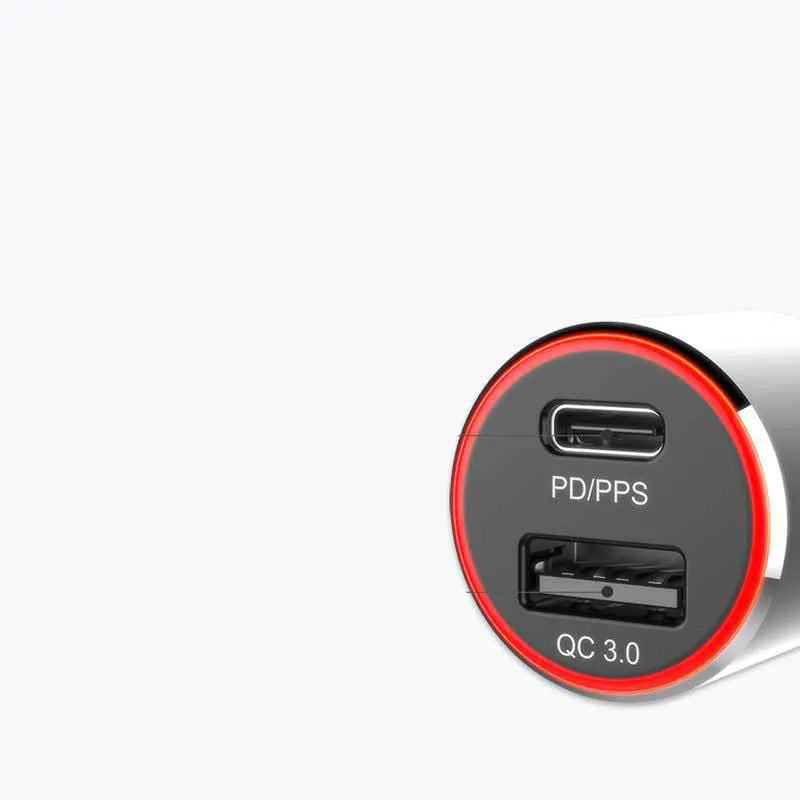 Compact 83W dual-port fast car charger with USB-C and QC3.0 ports plugged into a vehicle 12V socket.