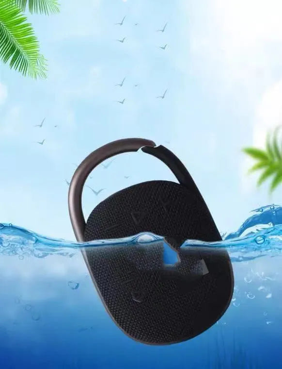 Compact portable Bluetooth speaker in one of six colours: pink, blue, black, red, silver grey, or green.