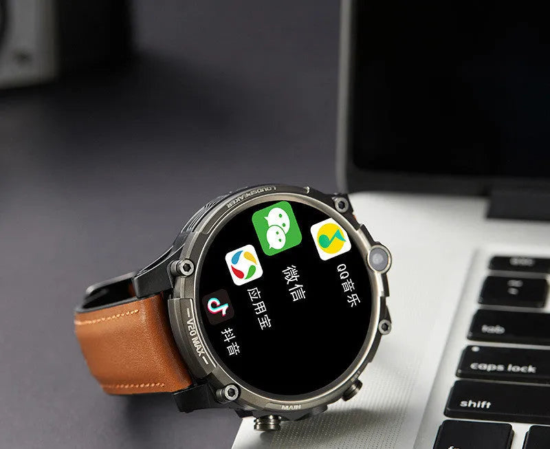 Black smartwatch with 4G, dual cameras, and a 1.6-inch screen on a wrist strap.