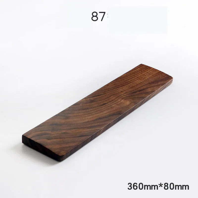 Solid walnut wood mechanical keyboard wrist rest showing natural grain pattern