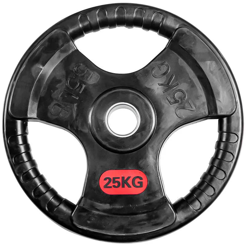 Black cast iron barbell weight plate with rubber coating placed on a mat with a storage bag nearby