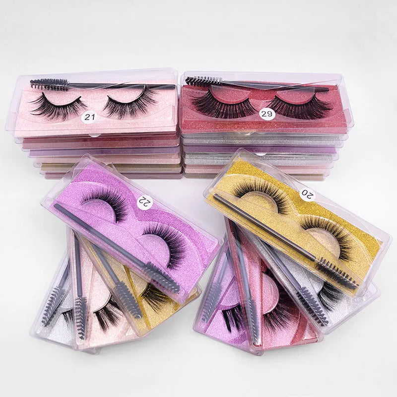 Natural 3D false eyelashes with elongated eye tail, imitation mink, plastic cotton thread stem, includes brush.